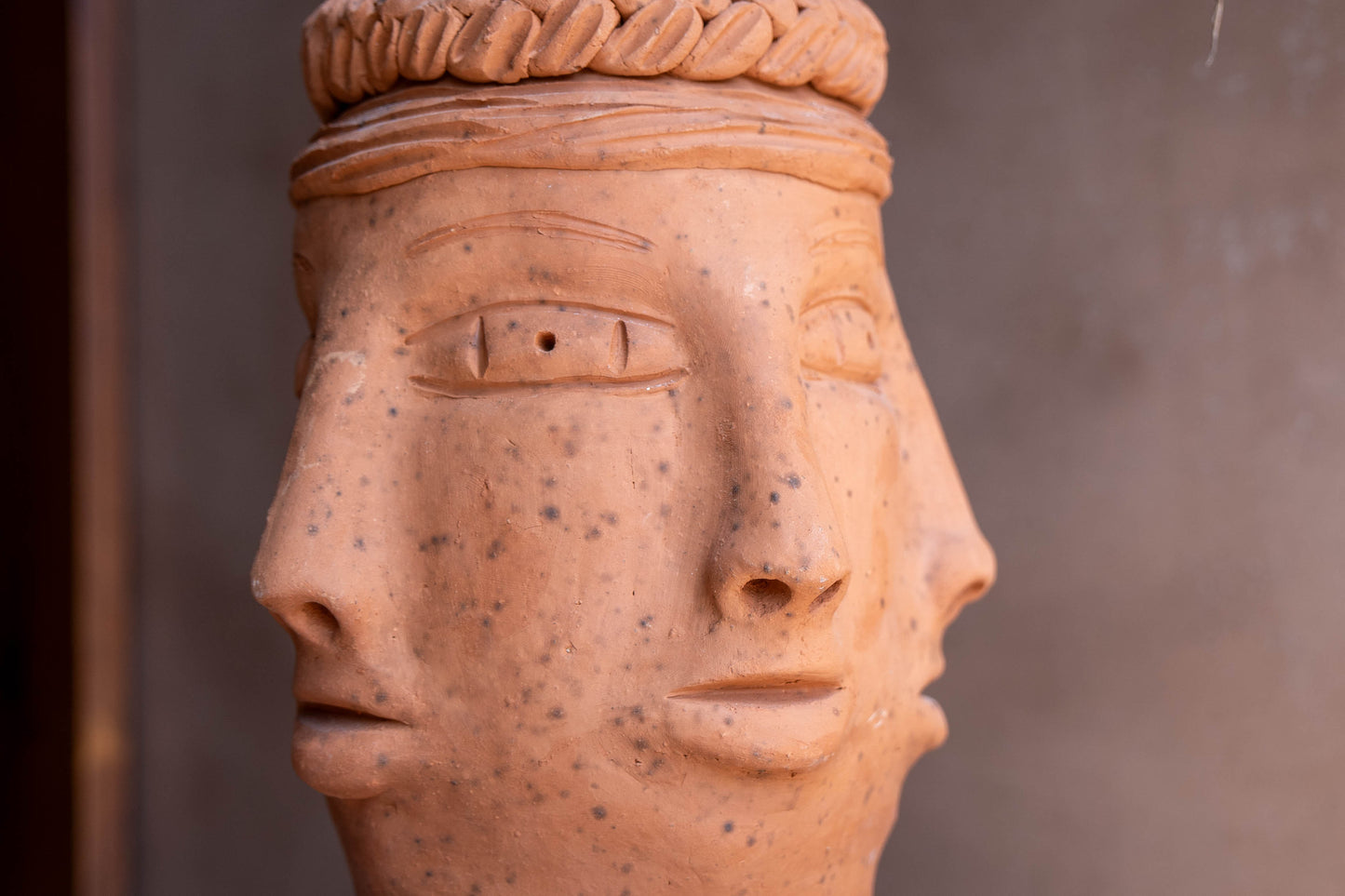 Five Faces Clay Pot