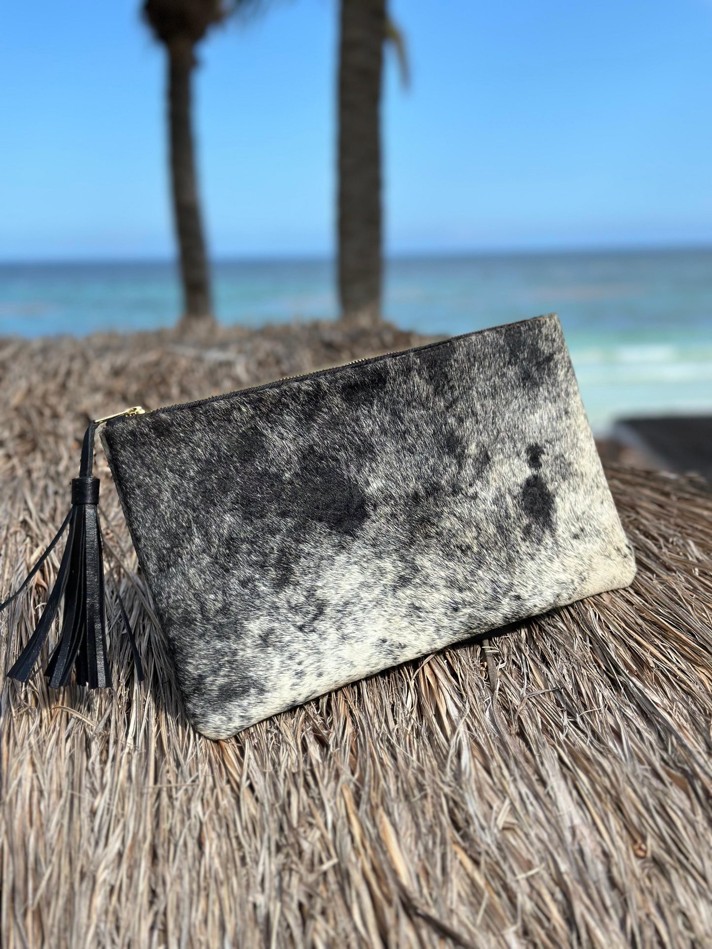 Cowhide Clutch with Leather Tassels