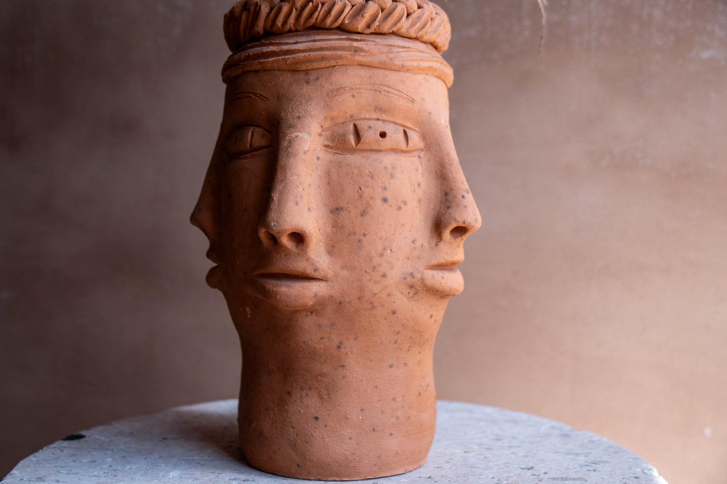 Five Faces Clay Pot